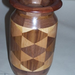 Walnut vase constructed out of triangles