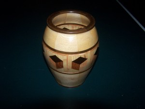 Segmented Wood turning. Ash vase with 3D highlight ring of tumbling block design.