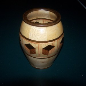 Segmented Wood turning. Ash vase with 3D highlight ring of tumbling block design.