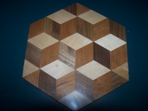 2 Inch tumbling blocks of walnut , birch and cherry.