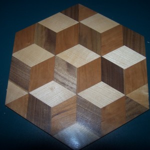 2 Inch tumbling blocks of walnut , birch and cherry.