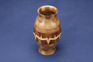 Multi generational segmented wood turning. Walnut vase with maple, 3 generation lamination design.