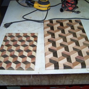 3D tumbling block and trapezoid Brazilian Walnut and Cherry with Ash. These cutting boards weigh approx. 5 pounds each.